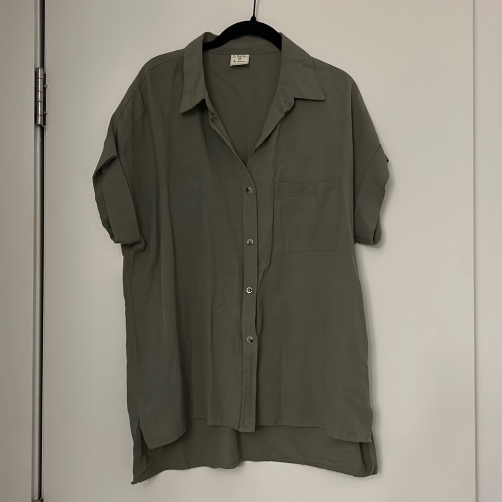 Olive green button up short sleeve shirt with rolled sleeves